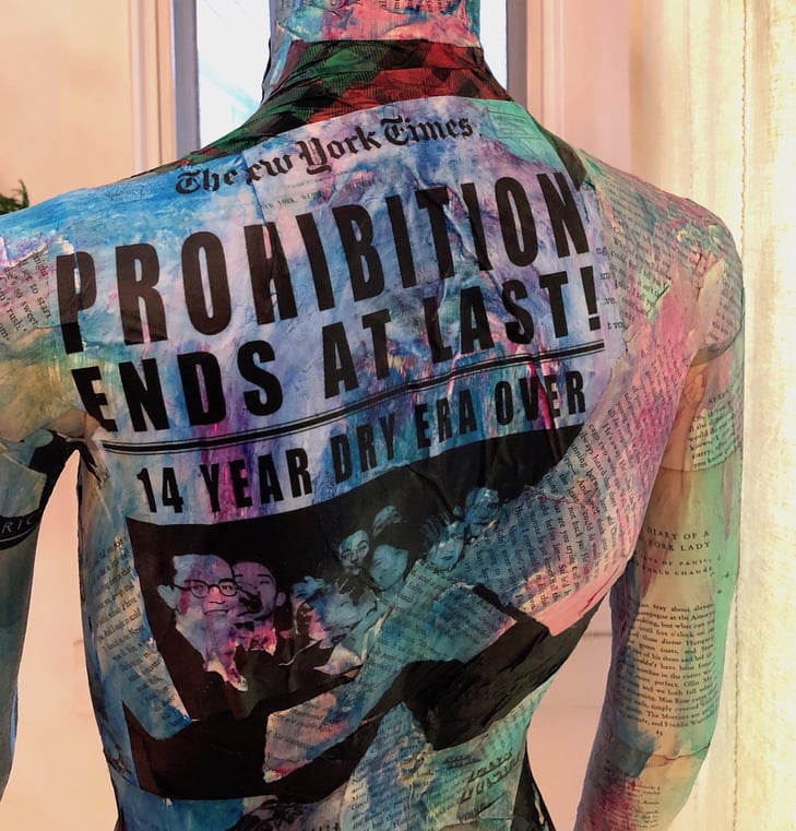 A mannequin with newsprint as skin with the newspaper title "Prohibition Ends At Last"
