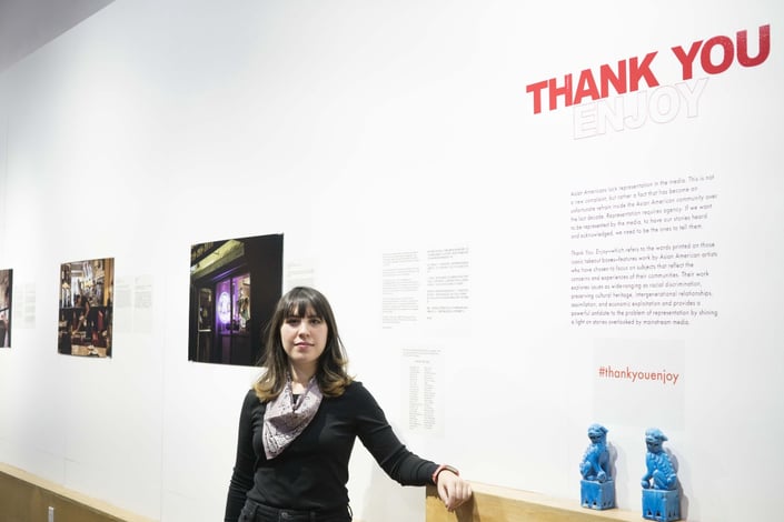 Photographer and writer Katie Salisbury at the first installation of her exhibition “Thank You, Enjoy” in NYC