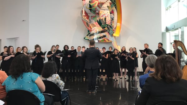 Habitat- Home participants performing for an audience in a gallery 