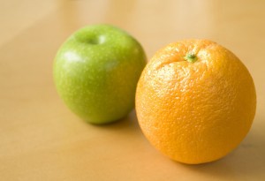 One green apple and one orange