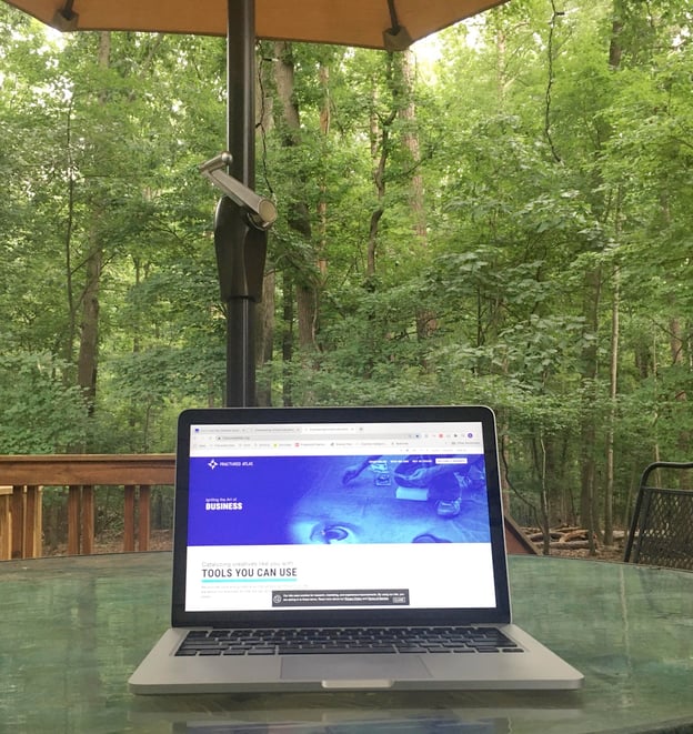 Laptop on outdoor porch