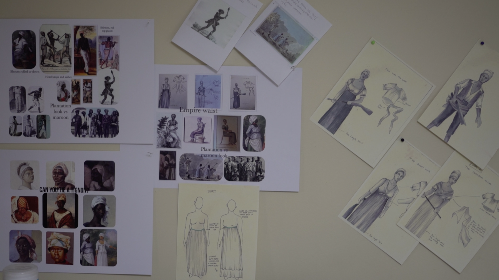 A wall with reference images for antebellum fashion used by the project's costume designers