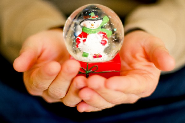 A snow globe featuring a snowman.