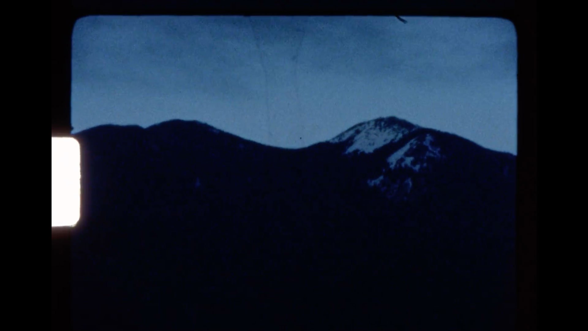 A Super 8 film reel clip of a mountain from Goldilocks